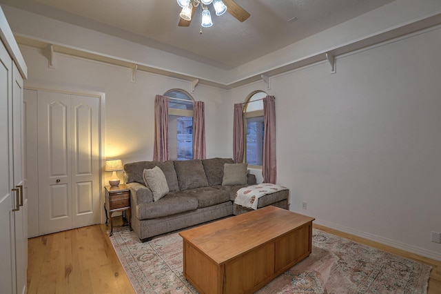 4110 Waterwillow Pl NW, Albuquerque, NM 87120 - living room featuring a ceiling fan and light wood-type flooring