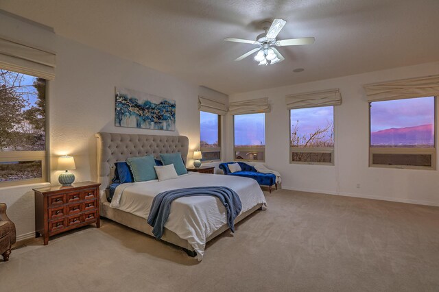 4110 Waterwillow Pl NW, Albuquerque, NM 87120 - carpeted bedroom featuring baseboards and a ceiling fan