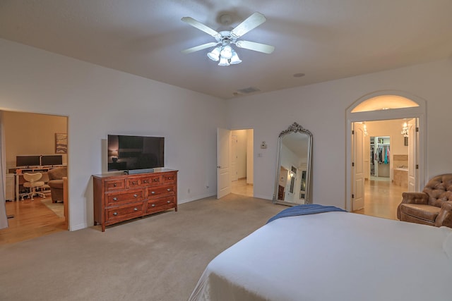 4110 Waterwillow Pl NW, Albuquerque, NM 87120 - bedroom with a walk in closet, light carpet, and a closet