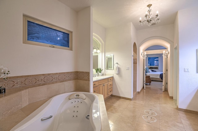 4110 Waterwillow Pl NW, Albuquerque, NM 87120 - full bathroom featuring vanity, ensuite bathroom, a chandelier, a tub with jets, and tile patterned flooring