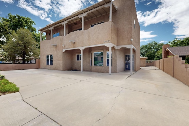 2517 Georgene Dr NE, Albuquerque, NM 87112 - view of front of property with stucco siding and a patio