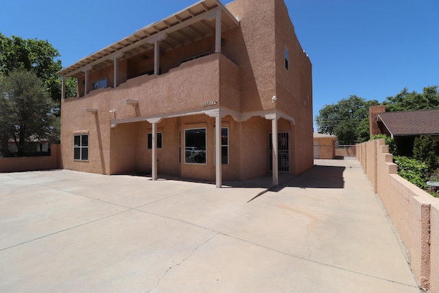 2517 Georgene Dr NE, Albuquerque, NM 87112 - back of property featuring stucco siding and a patio
