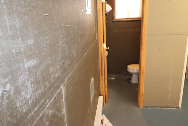 2517 Georgene Dr NE, Albuquerque, NM 87112 - bathroom featuring toilet and finished concrete flooring