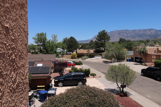 2517 Georgene Dr NE, Albuquerque, NM 87112 - view of asphalt street with a mountain view and sidewalks