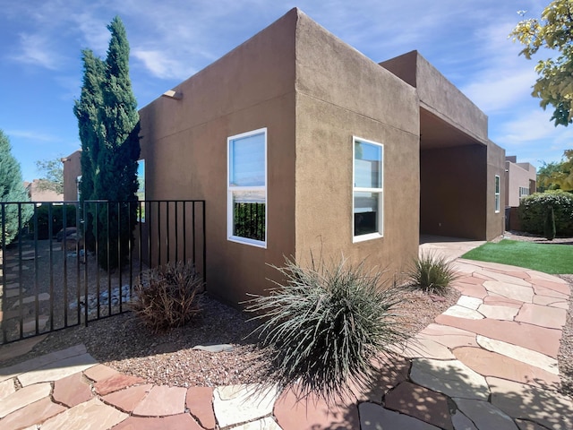 1713 Caramesa Dr SE, Rio Rancho, NM 87124 - view of home's exterior featuring stucco siding