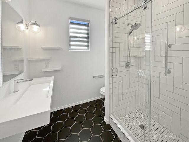 1713 Caramesa Dr SE, Rio Rancho, NM 87124 - bathroom with a shower stall, tile patterned flooring, toilet, vanity, and baseboards