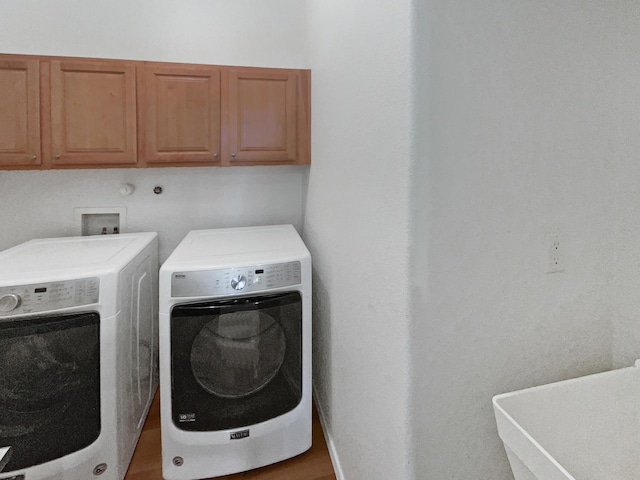 1713 Caramesa Dr SE, Rio Rancho, NM 87124 - laundry room with cabinet space and washer and clothes dryer