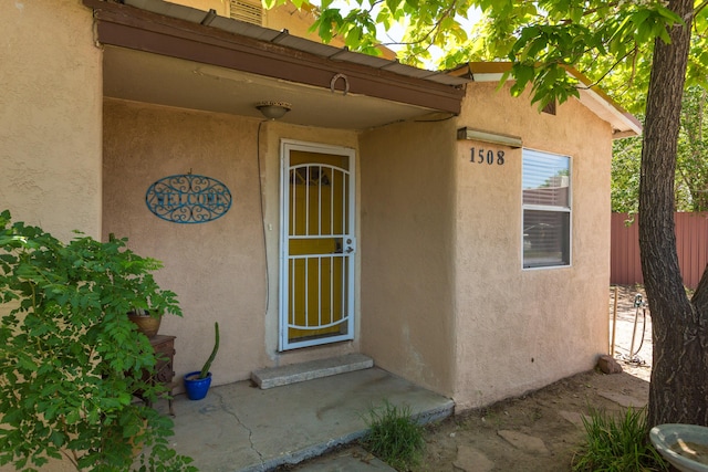 1508 Barelas Rd SW, Albuquerque, NM 87102 - doorway to property featuring stucco siding