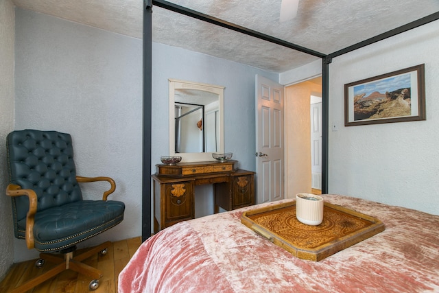 1508 Barelas Rd SW, Albuquerque, NM 87102 - bedroom with a textured wall and wood-type flooring