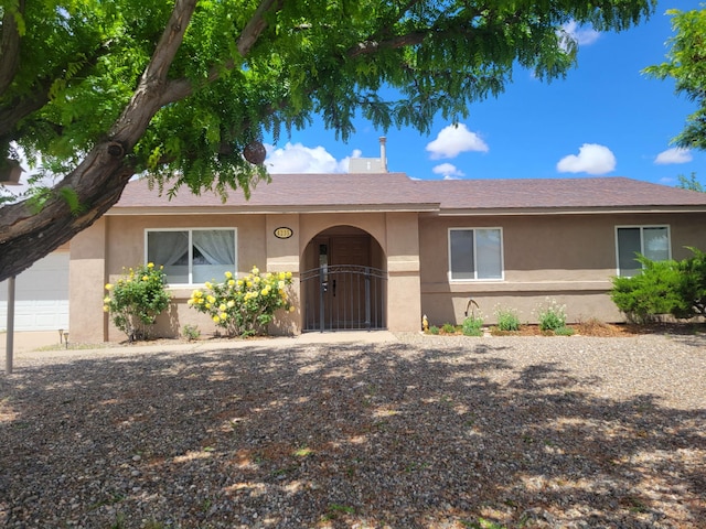 4235 Pumice Dr NE, Rio Rancho, NM 87124 - ranch-style home featuring stucco siding and roof with shingles