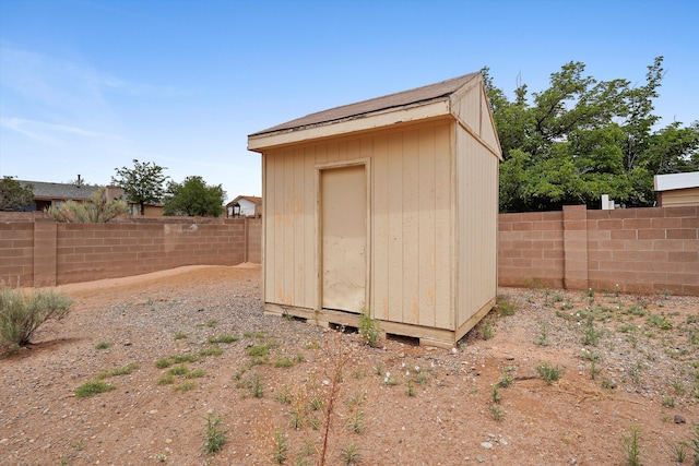 4235 Pumice Dr NE, Rio Rancho, NM 87124 - view of shed featuring a fenced backyard