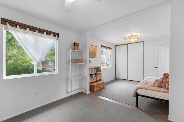 4235 Pumice Dr NE, Rio Rancho, NM 87124 - living area featuring carpet flooring, baseboards, and ceiling fan