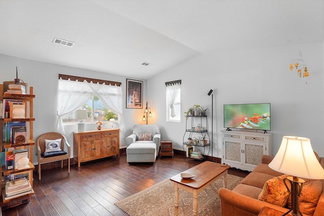4235 Pumice Dr NE, Rio Rancho, NM 87124 - living room with vaulted ceiling, wood-type flooring, and baseboards