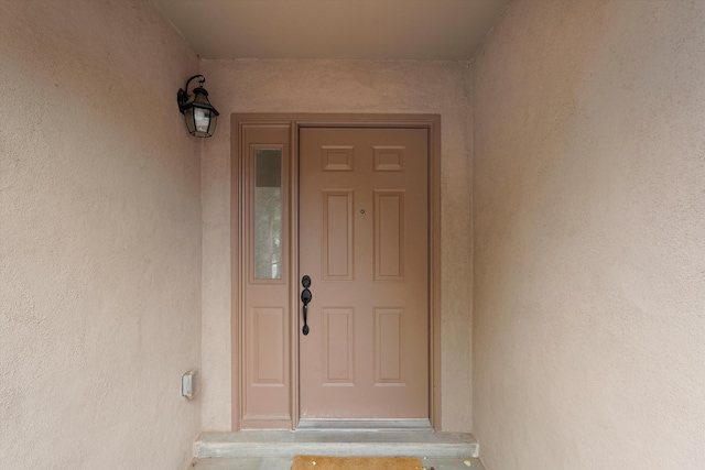 4235 Pumice Dr NE, Rio Rancho, NM 87124 - view of exterior entry with stucco siding