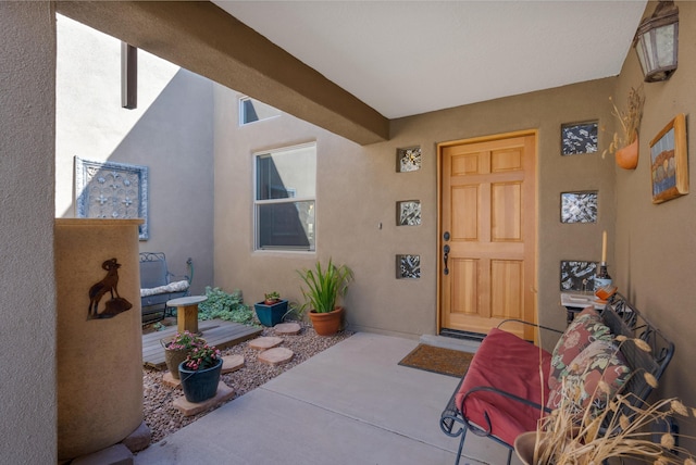 4612 Cactus Ave NW, Albuquerque, NM 87114 - doorway to property featuring stucco siding