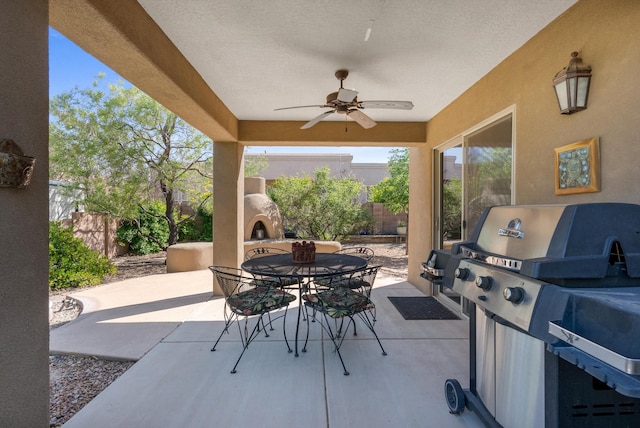 4612 Cactus Ave NW, Albuquerque, NM 87114 - fenced backyard featuring a ceiling fan, outdoor dining area, and a patio area