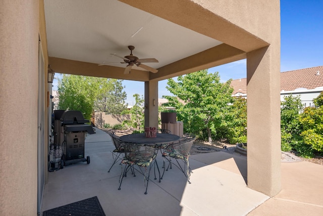 4612 Cactus Ave NW, Albuquerque, NM 87114 - view of patio / terrace with a ceiling fan, outdoor dining space, and a grill