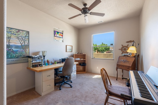 4612 Cactus Ave NW, Albuquerque, NM 87114 - office with light colored carpet, a ceiling fan, a textured ceiling, and baseboards