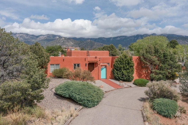 1704 Quail Run Ct NE, Albuquerque, NM 87122 - southwest-style home featuring a mountain view and stucco siding