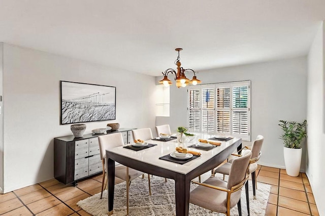 1704 Quail Run Ct NE, Albuquerque, NM 87122 - dining room featuring a chandelier and light tile patterned floors