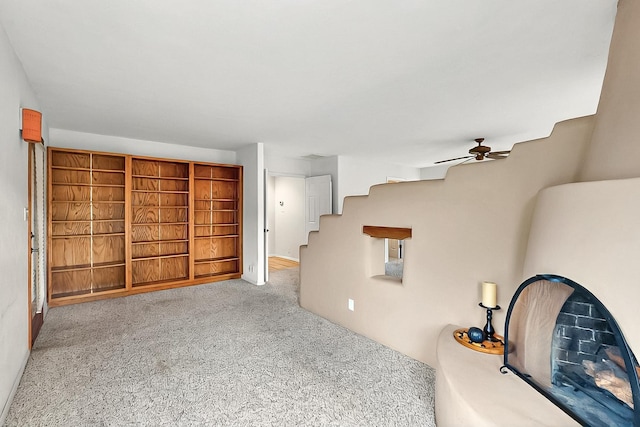 1704 Quail Run Ct NE, Albuquerque, NM 87122 - unfurnished living room with a ceiling fan, carpet floors, and stairs