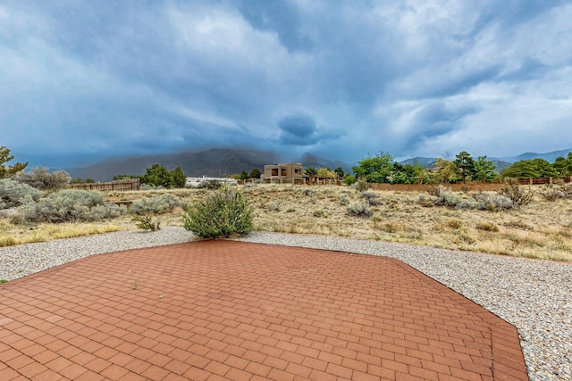 1704 Quail Run Ct NE, Albuquerque, NM 87122 - view of patio with a mountain view