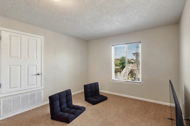 1412 Wind Ridge Dr NW, Albuquerque, NM 87120 - unfurnished room with carpet flooring and a textured ceiling