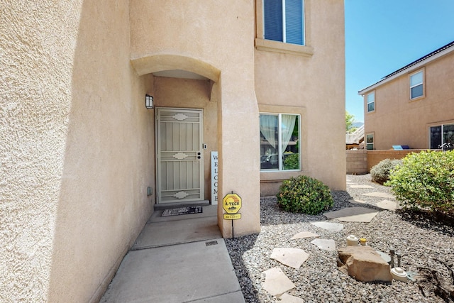 1412 Wind Ridge Dr NW, Albuquerque, NM 87120 - property entrance with stucco siding