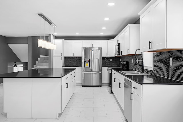 2212 Henry Rd SW, Albuquerque, NM 87105 - kitchen featuring stainless steel appliances, light marble finish floors, dark countertops, recessed lighting, and a sink