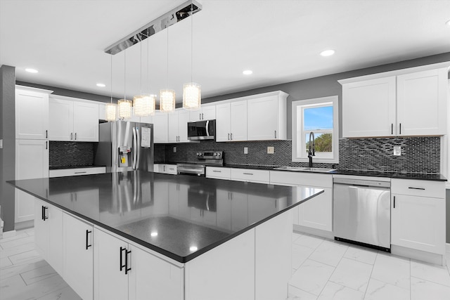 2212 Henry Rd SW, Albuquerque, NM 87105 - kitchen featuring stainless steel appliances, a sink, dark countertops, and recessed lighting