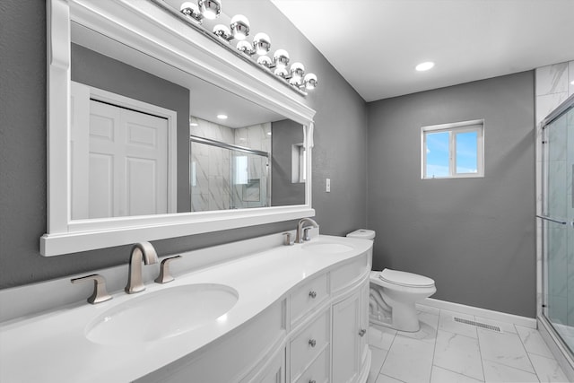 2212 Henry Rd SW, Albuquerque, NM 87105 - full bathroom featuring a stall shower, toilet, double vanity, marble finish flooring, and recessed lighting