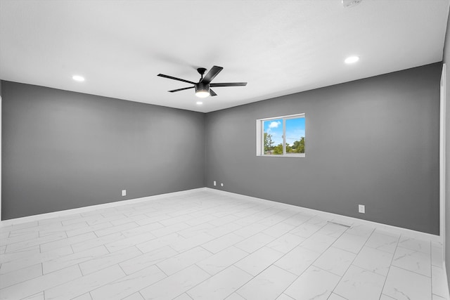 2212 Henry Rd SW, Albuquerque, NM 87105 - empty room with a ceiling fan, recessed lighting, baseboards, and light marble finish flooring