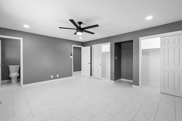 2212 Henry Rd SW, Albuquerque, NM 87105 - unfurnished bedroom with multiple closets, light marble finish floors, recessed lighting, baseboards, and a ceiling fan