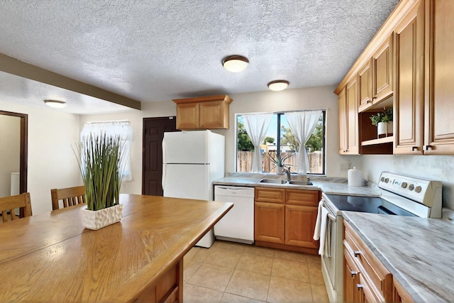 3039 Prenda De Oro Dr NW, Albuquerque, NM 87120 - kitchen featuring white appliances, light countertops, light tile patterned flooring, a sink, and open shelves