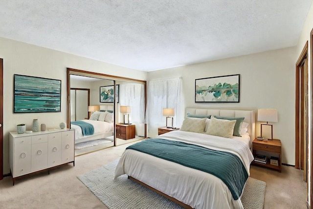 3039 Prenda De Oro Dr NW, Albuquerque, NM 87120 - bedroom featuring light colored carpet, a textured ceiling, and a closet