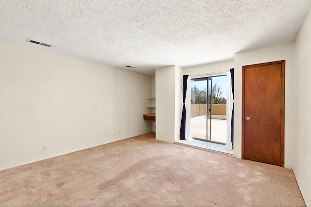 3039 Prenda De Oro Dr NW, Albuquerque, NM 87120 - spare room featuring carpet floors and a textured ceiling
