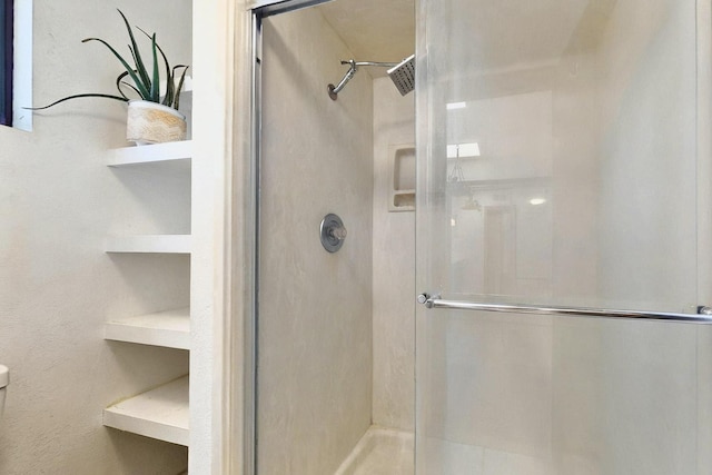 3039 Prenda De Oro Dr NW, Albuquerque, NM 87120 - full bathroom with a shower stall and toilet