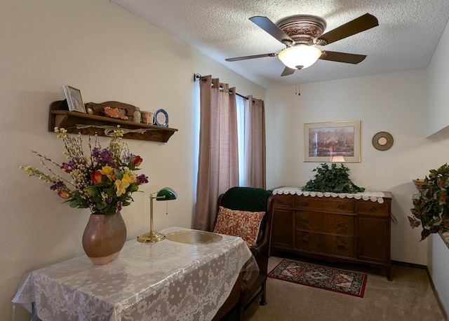 3501 Juan Tabo Blvd NE Unit K9, Albuquerque, NM 87111 - dining room featuring light carpet, a textured ceiling, and a ceiling fan