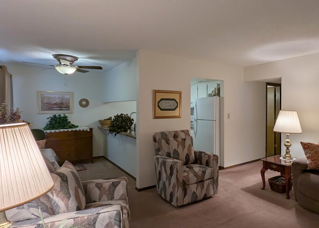 3501 Juan Tabo Blvd NE Unit K9, Albuquerque, NM 87111 - living room with light colored carpet, ceiling fan, and baseboards