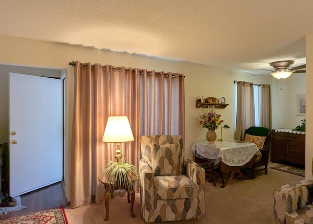 3501 Juan Tabo Blvd NE Unit K9, Albuquerque, NM 87111 - carpeted dining space featuring a textured ceiling and ceiling fan