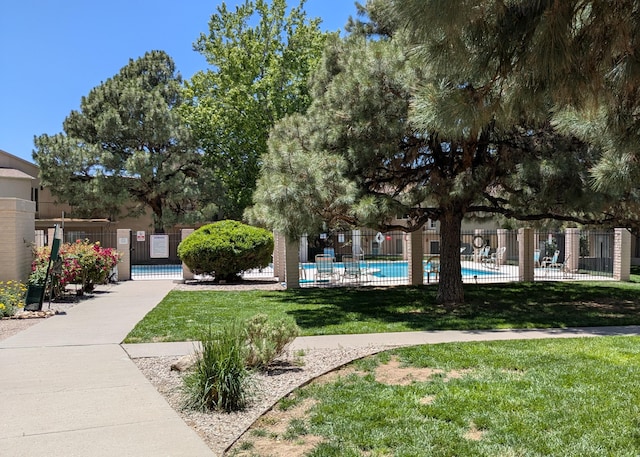3501 Juan Tabo Blvd NE Unit K9, Albuquerque, NM 87111 - view of yard featuring a community pool