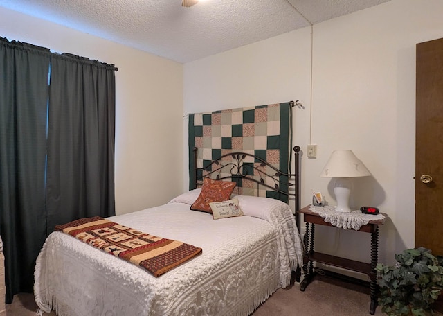 3501 Juan Tabo Blvd NE Unit K9, Albuquerque, NM 87111 - bedroom with carpet floors and a textured ceiling