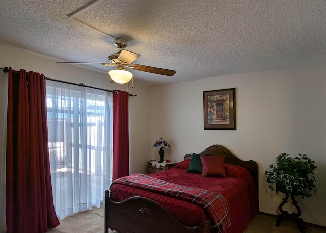 3501 Juan Tabo Blvd NE Unit K9, Albuquerque, NM 87111 - bedroom featuring light carpet, a textured ceiling, and a ceiling fan