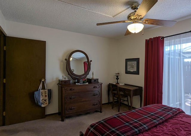 3501 Juan Tabo Blvd NE Unit K9, Albuquerque, NM 87111 - carpeted bedroom with a textured ceiling and a ceiling fan