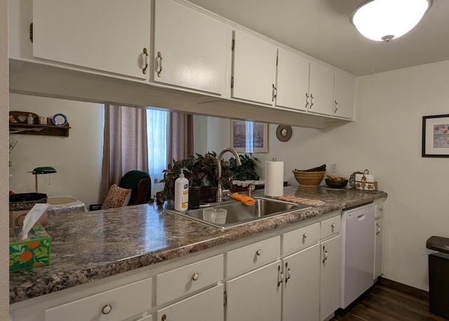 3501 Juan Tabo Blvd NE Unit K9, Albuquerque, NM 87111 - kitchen with dishwasher, a sink, dark wood-type flooring, white cabinetry, and dark countertops