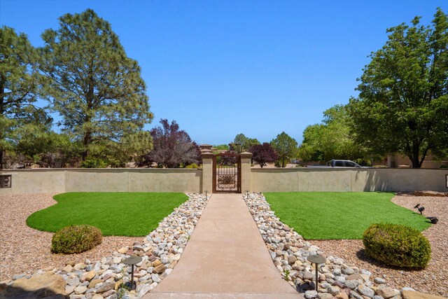 9301 Black Farm Ln NW, Albuquerque, NM 87114 - fenced front yard featuring a gate