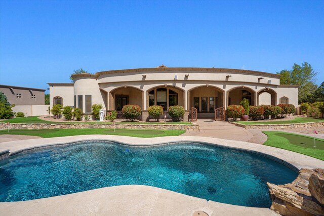 9301 Black Farm Ln NW, Albuquerque, NM 87114 - swimming pool with a putting area and a patio