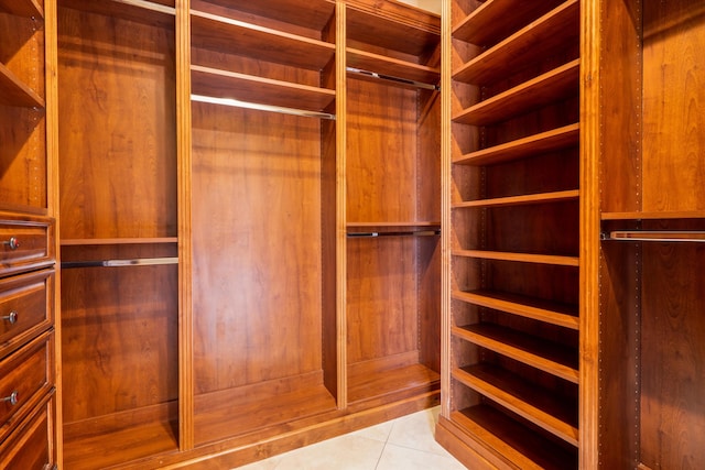 9301 Black Farm Ln NW, Albuquerque, NM 87114 - walk in closet featuring light tile patterned floors