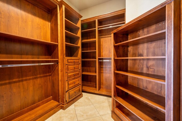 9301 Black Farm Ln NW, Albuquerque, NM 87114 - walk in closet featuring light tile patterned floors