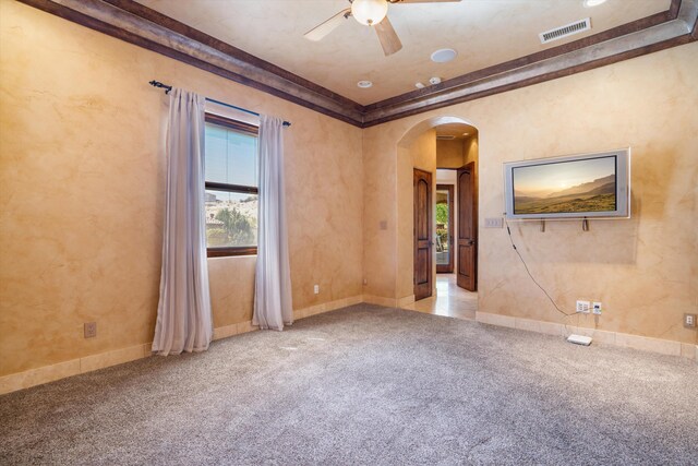 9301 Black Farm Ln NW, Albuquerque, NM 87114 - carpeted spare room with arched walkways, healthy amount of natural light, and a ceiling fan